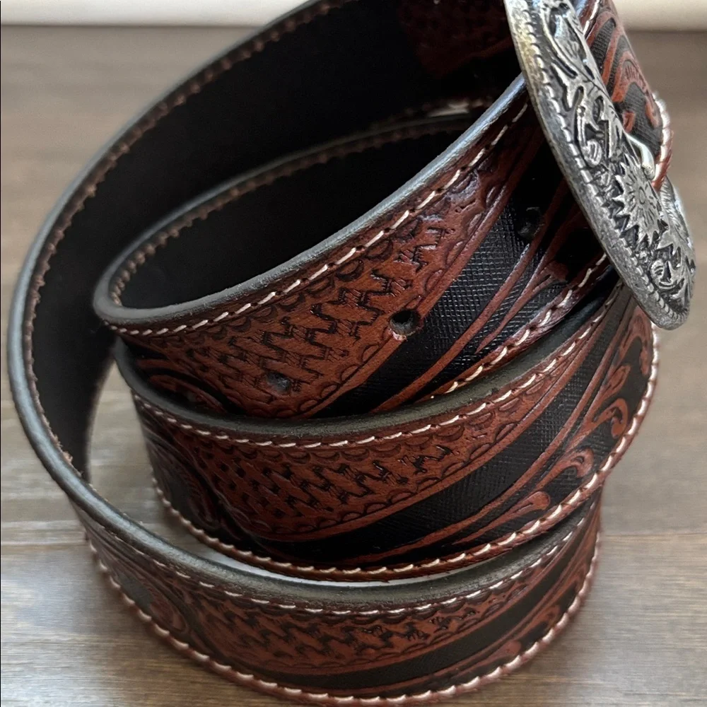 Ridge Mountain Genuine tooled leather,single stitch, silvertone embossed buckle